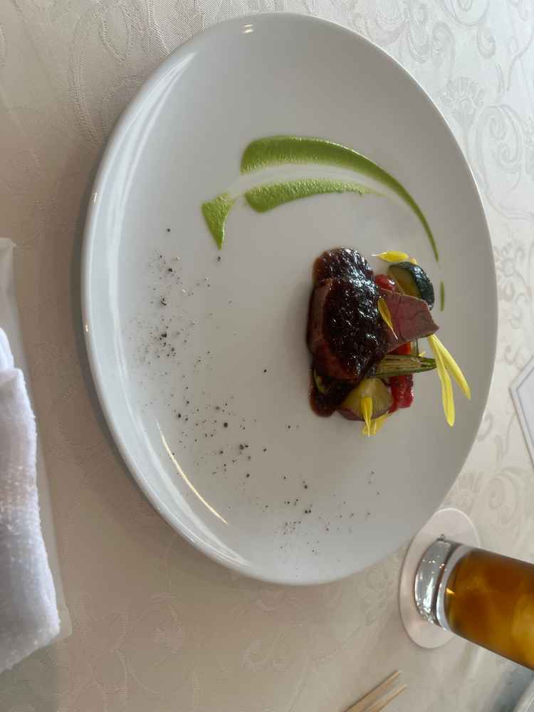 醤油ベースの料理で，顧客満足度も高いそうで美味しかった。