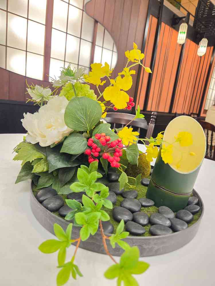 テーブルコーディネートのお花。和の雰囲気が会場に合ってました。