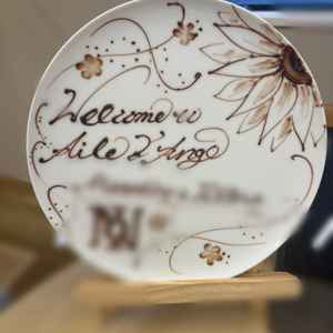 サプライズで料理長が書いて出してくれたプレート