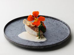 真鯛のポワレ クミン風味 ジュ・ド・コキヤージュ