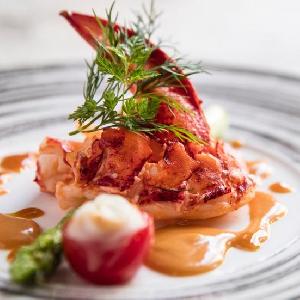 『オマール海老のポワレ オレンジとアメリカンのソース』