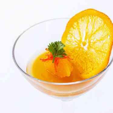 フォアグラのパルフェ　〝沖縄県産タンカン″のジュレ　オレンジのチュイルを添えて