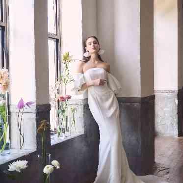 アニヴェルセル 大阪 トレンドの袖付きマーメイドドレス