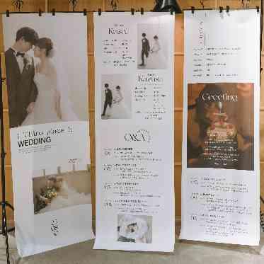 ampersand By LAGUNAVEIL ATELIER(アンパサンド バイ ラグナヴェールアトリエ) 会場エントランスにはお二人のプロフィールが載ったポスターを装飾