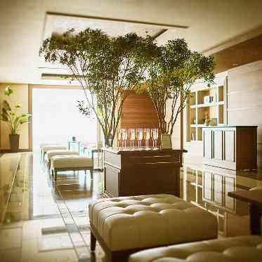 アルマリアン東京 落ち着いたトーンの木目を基調とした専用ロビーでゲストにくつろいでいただける