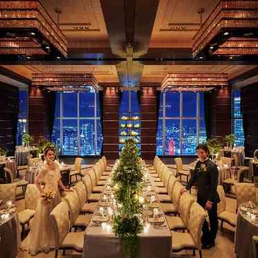 ラグナヴェール プレミア 夜景をバックにキャンドルコーディネートで大人ウエディングを